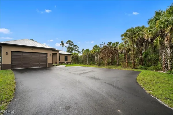 a view of a house with a garage