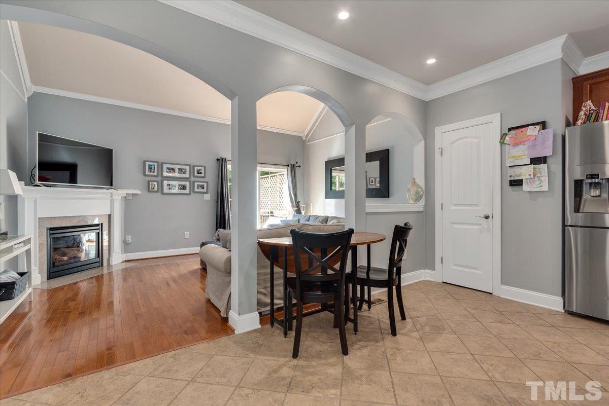 6 Piccadilly Court Durham, NC 27713 - Photo 9 of 27 a view of a dining room with furniture window and wooden floor