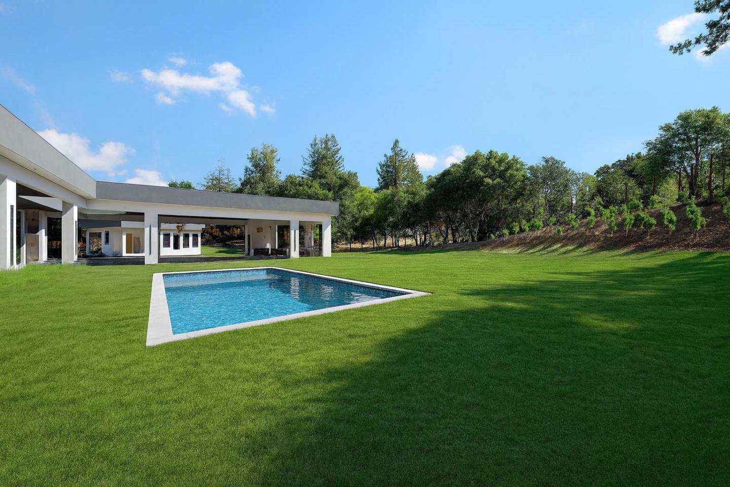 14680 Sobey Road Saratoga, CA 95070 - Photo 9 of 32 a view of a house with a swimming pool