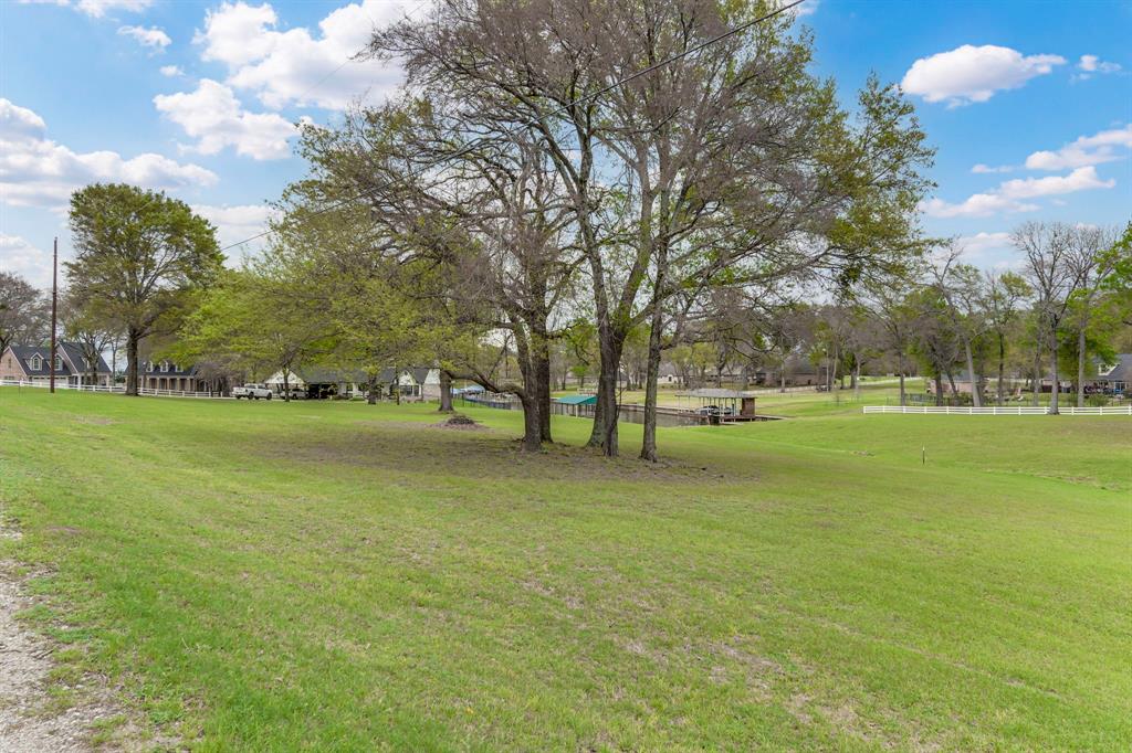 A2000 Azure Lane Streetman, TX 75859 - Photo 12 of 12 a view of building with trees