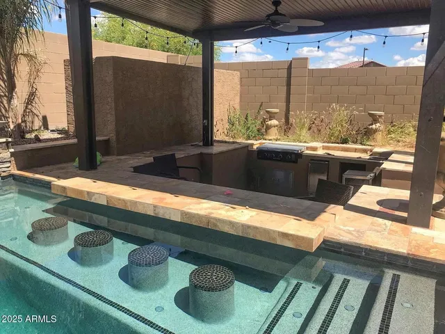 a view of balcony with furniture