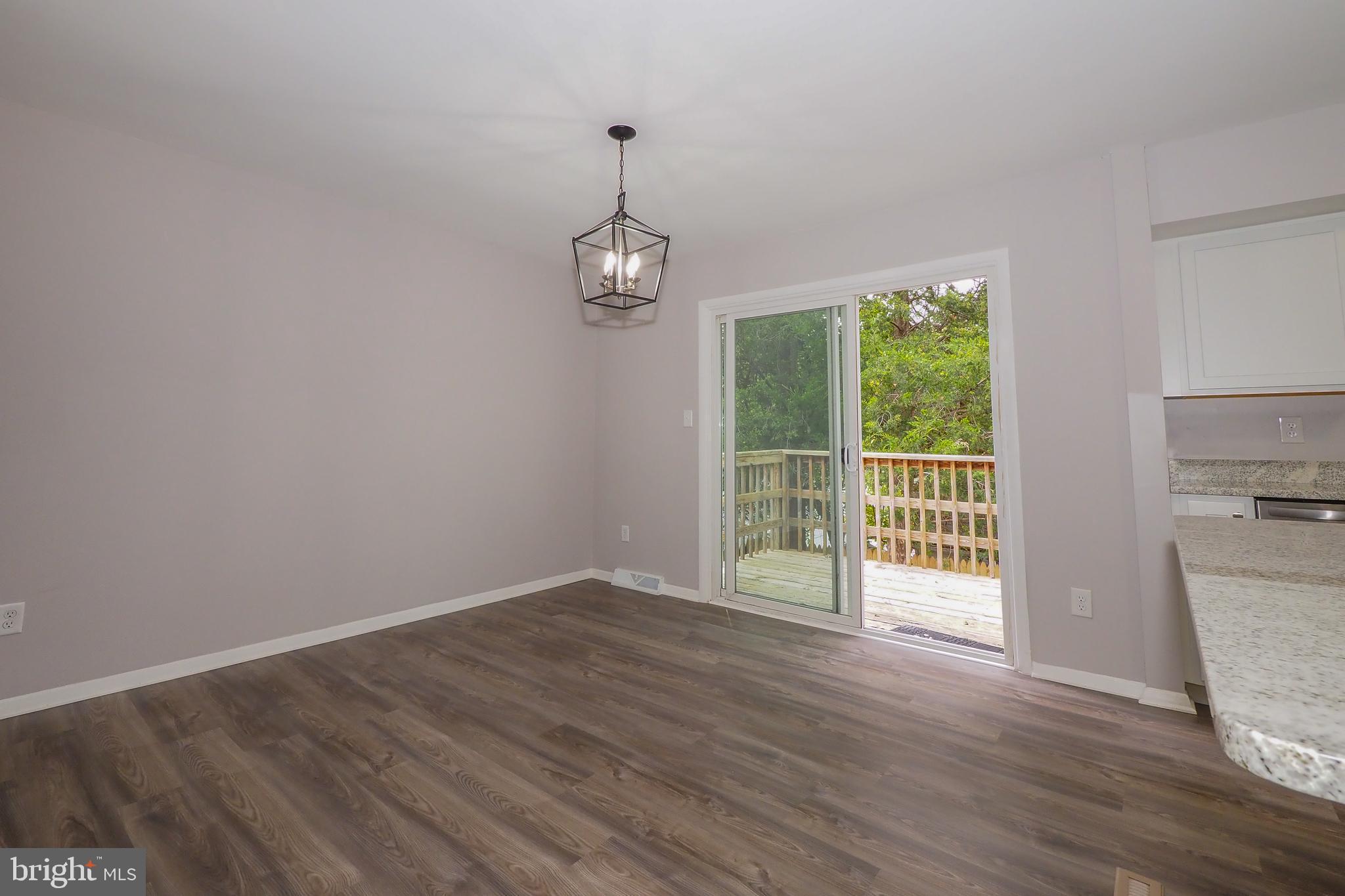 504 Tulip Road Riva, MD 21140 - Photo 12 of 60 Slider off of dining room with deck