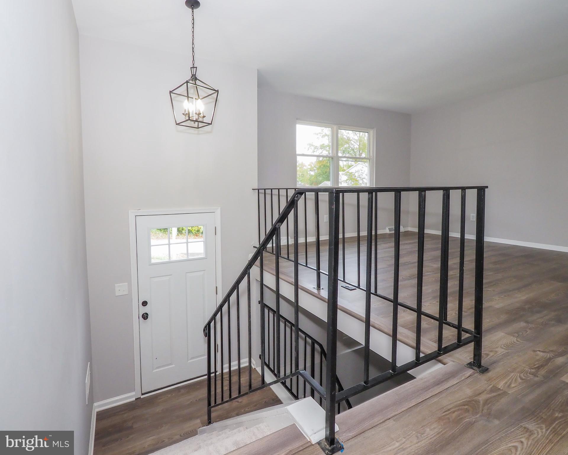 504 Tulip Road Riva, MD 21140 - Photo 3 of 60 Open foyer with new flooring and lighting