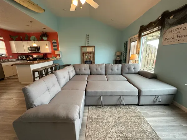 a kitchen with a table and chairs in it
