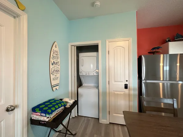 a view of a balcony with wooden floor