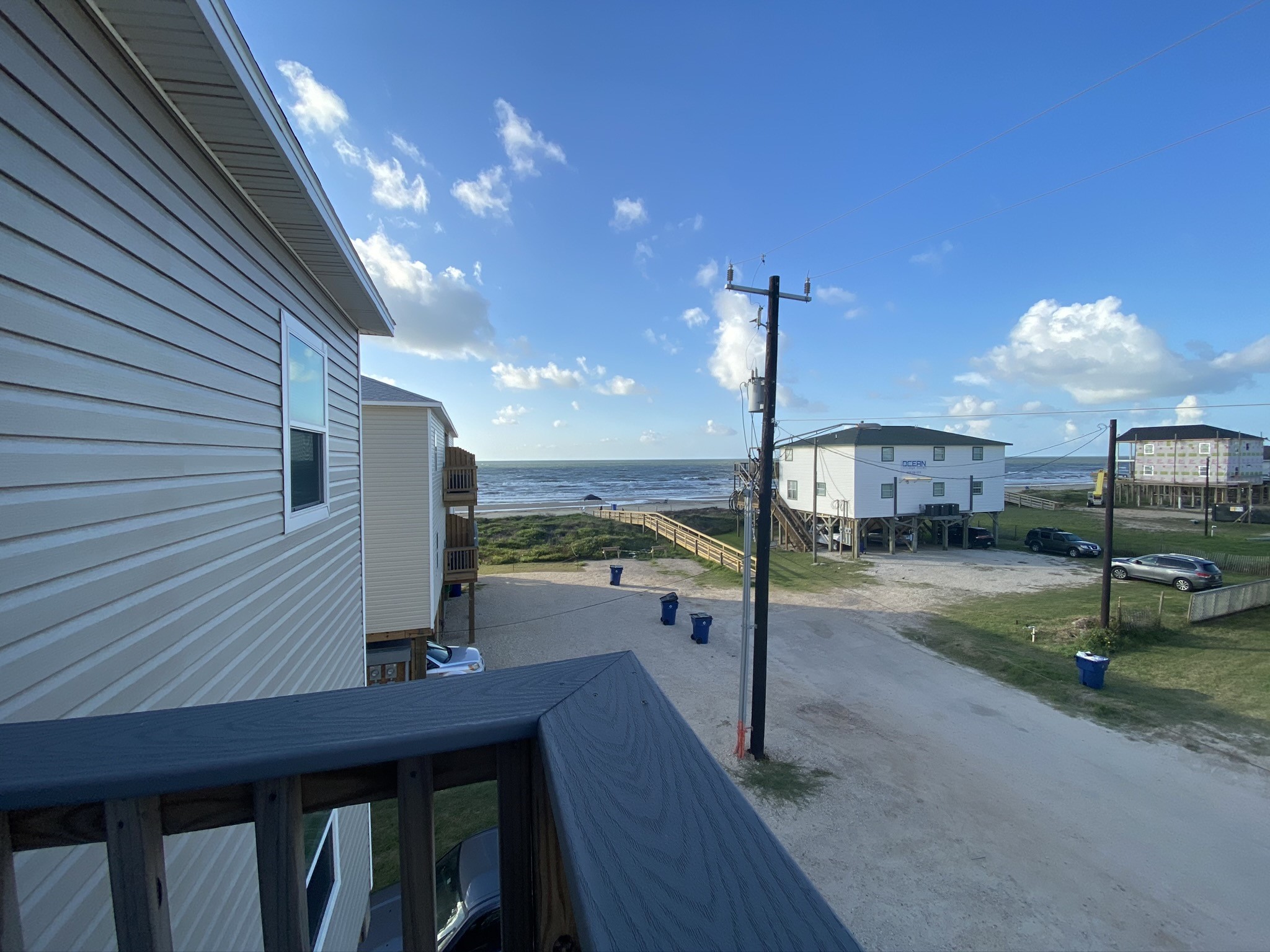 124 Howard Avenue, Unit D Surfside Beach, TX 77541 - Photo 34 of 50 a view of a patio with swimming pool