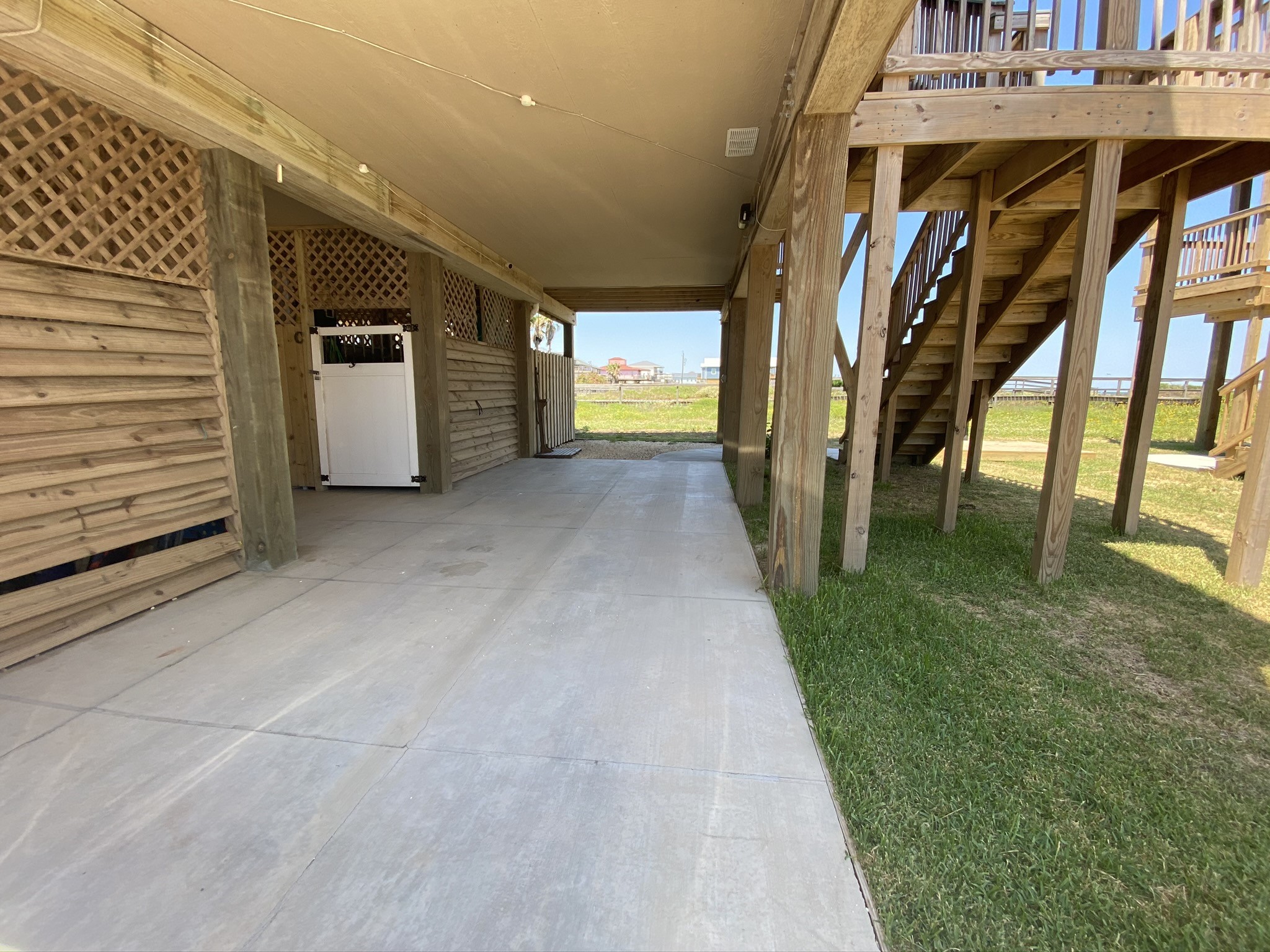 124 Howard Avenue, Unit D Surfside Beach, TX 77541 - Photo 6 of 50 a view of entryway with a yard