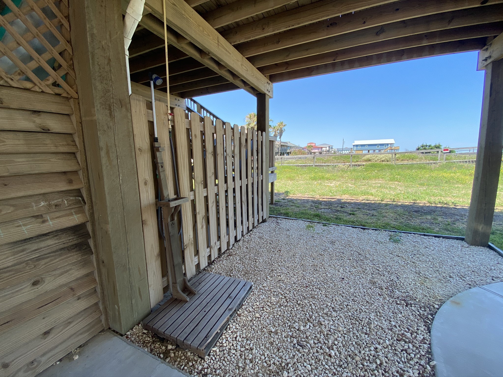 124 Howard Avenue, Unit D Surfside Beach, TX 77541 - Photo 7 of 50 a view of a room with wooden floor