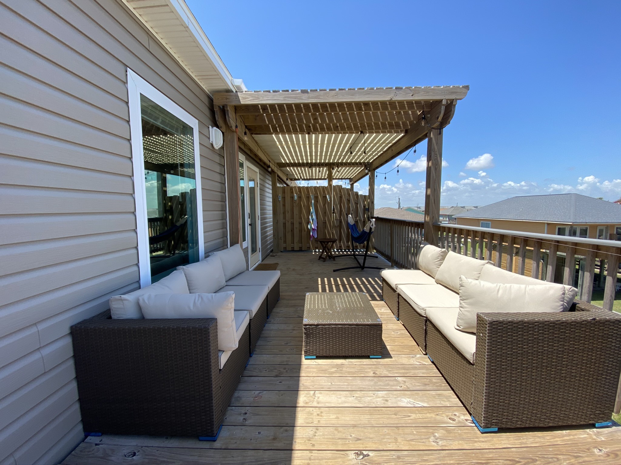 124 Howard Avenue, Unit D Surfside Beach, TX 77541 - Photo 8 of 50 a balcony with furniture