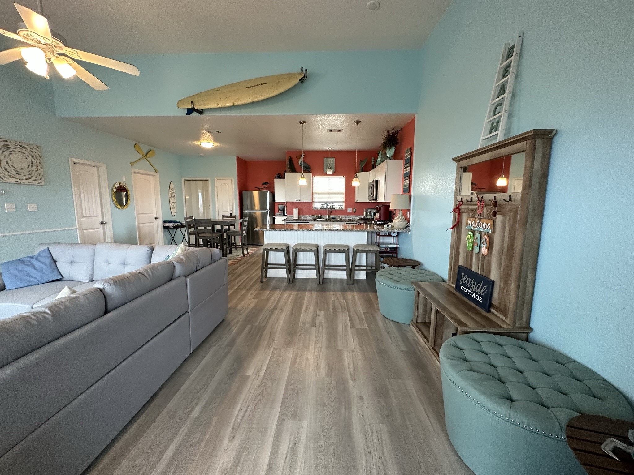 124 Howard Avenue, Unit D Surfside Beach, TX 77541 - Photo 10 of 50 a living room with furniture and a large window