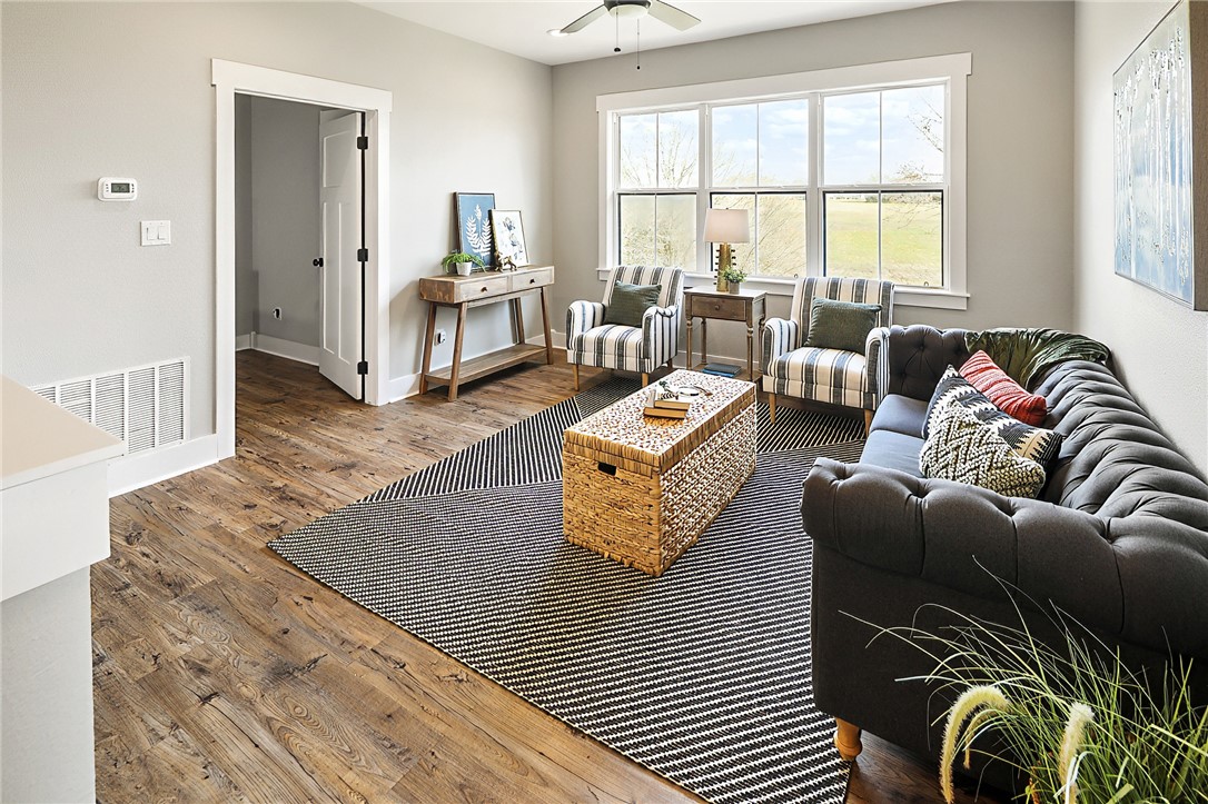 7323 River Ridge Drive College Station, TX 77845 - Photo 34 of 39 a living room with furniture and a large window