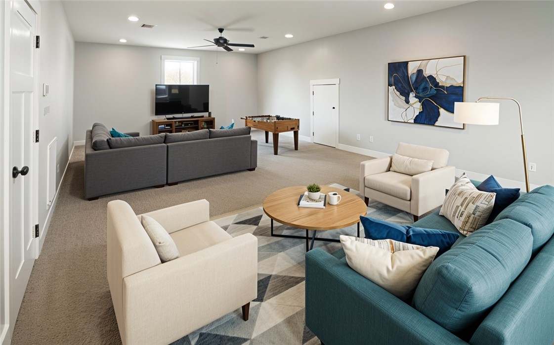7323 River Ridge Drive College Station, TX 77845 - Photo 6 of 39 a living room with furniture and a flat screen tv