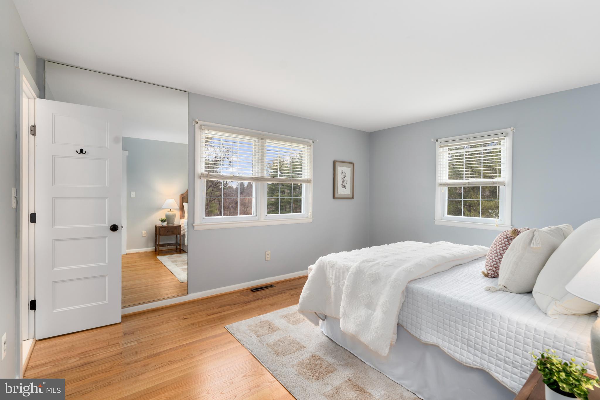 4406 Old Farm Road Baldwin, MD 21013 - Photo 19 of 49 a bedroom with a bed and wooden floor