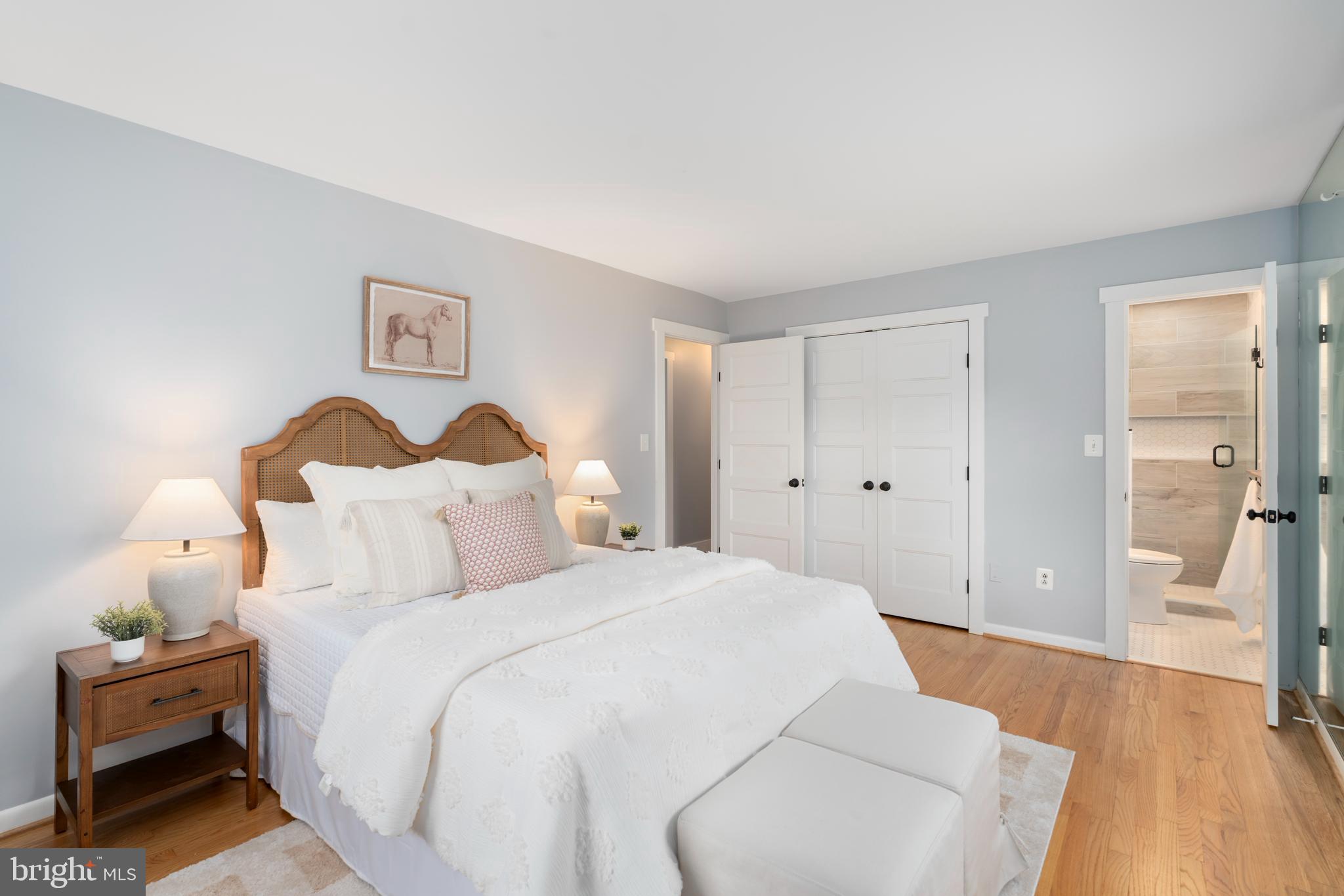 4406 Old Farm Road Baldwin, MD 21013 - Photo 21 of 49 a spacious bedroom with a bed and a painting on the wall