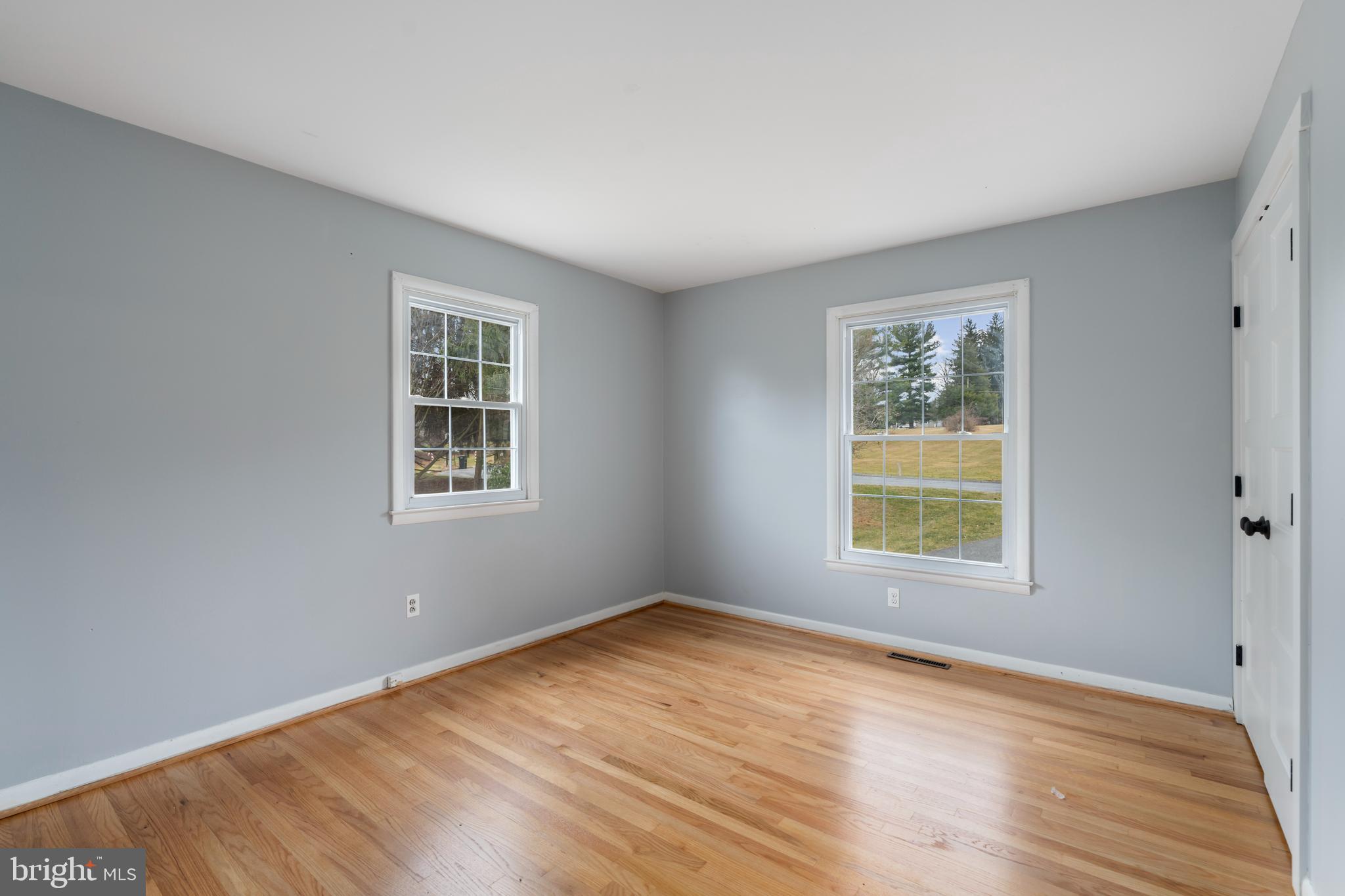 4406 Old Farm Road Baldwin, MD 21013 - Photo 26 of 49 an empty room with a window and wooden floor