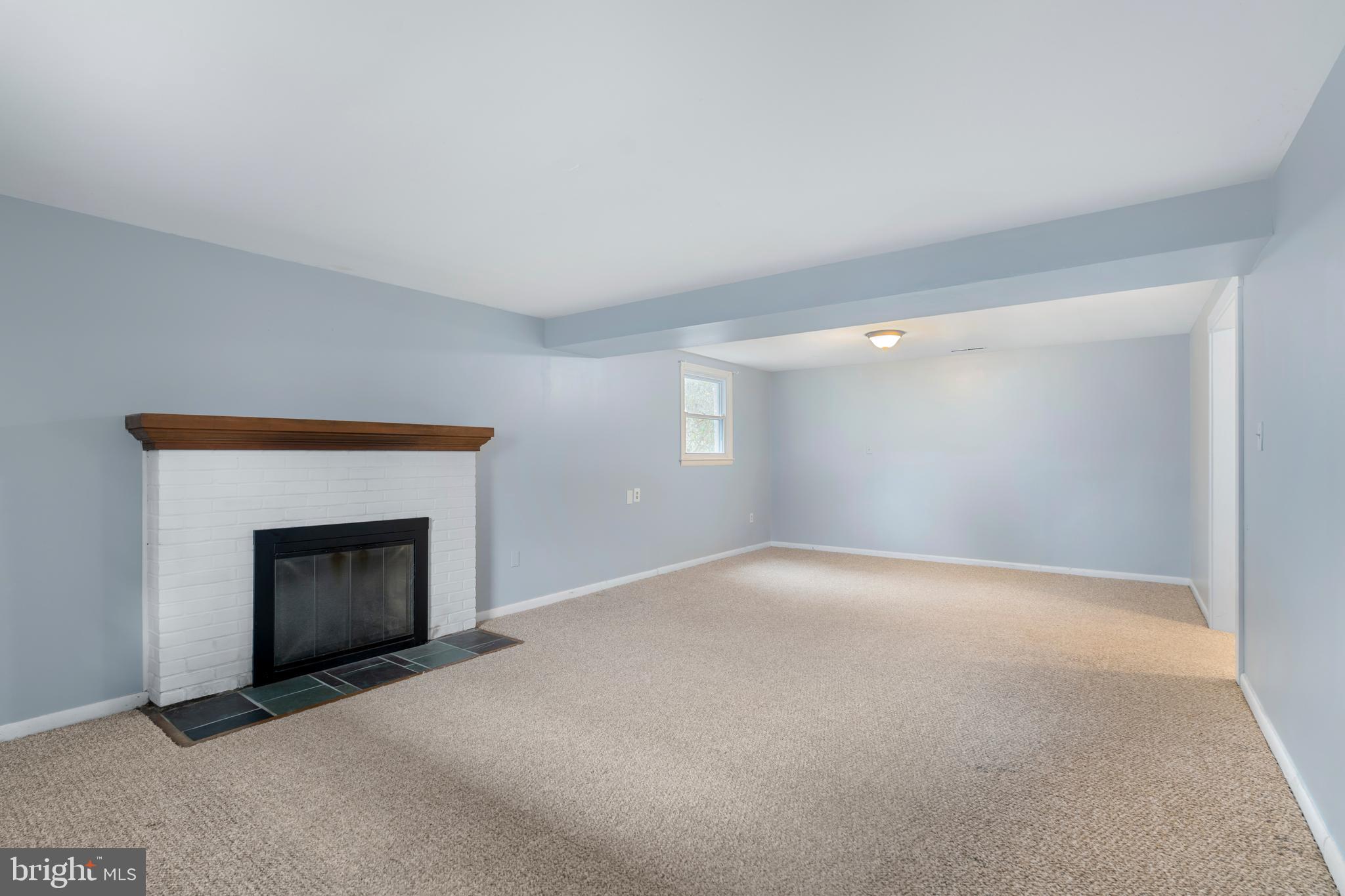 4406 Old Farm Road Baldwin, MD 21013 - Photo 31 of 49 a view of empty room with a fireplace