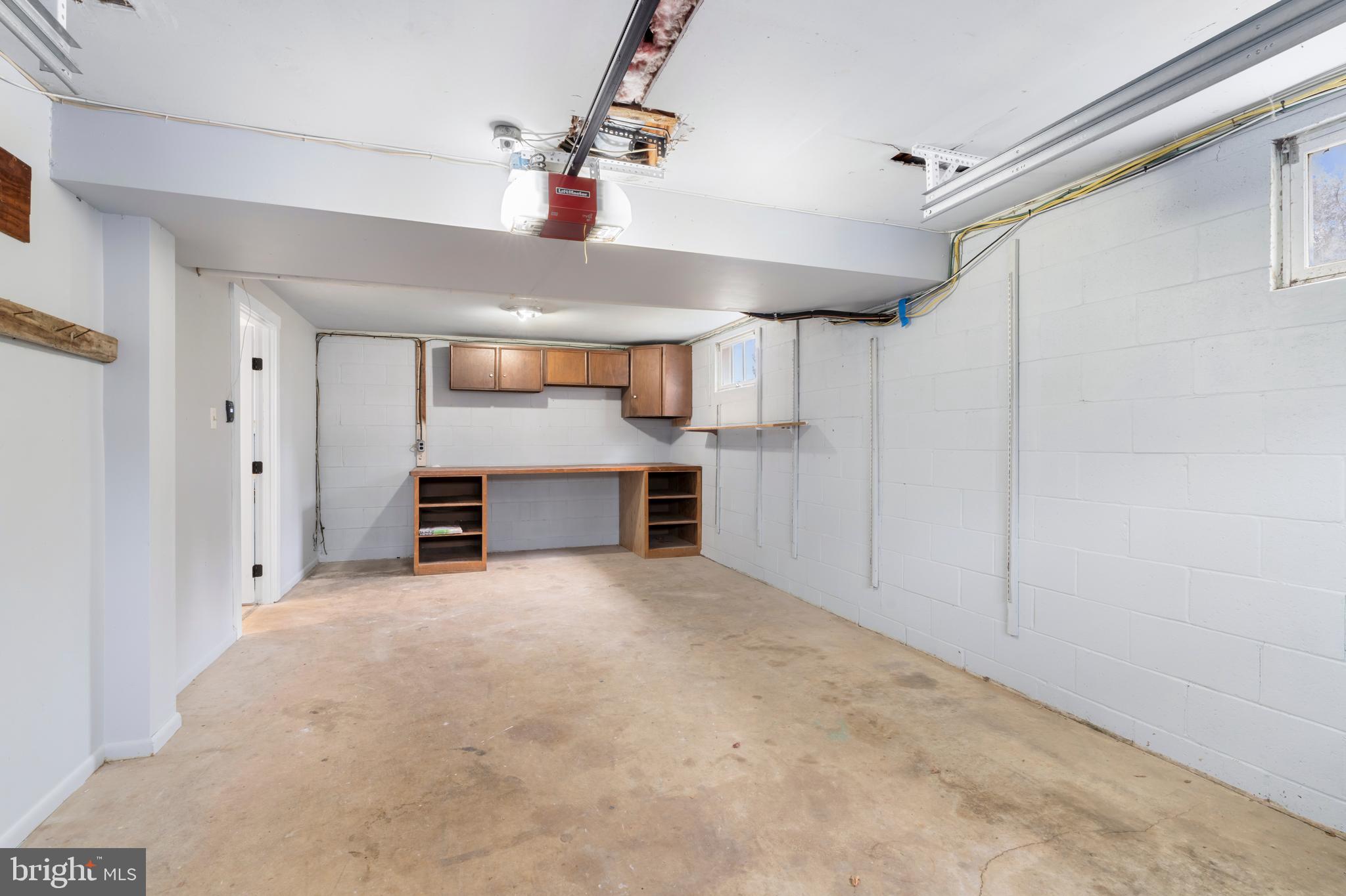 4406 Old Farm Road Baldwin, MD 21013 - Photo 37 of 49 a view of a kitchen with a sink and a refrigerator