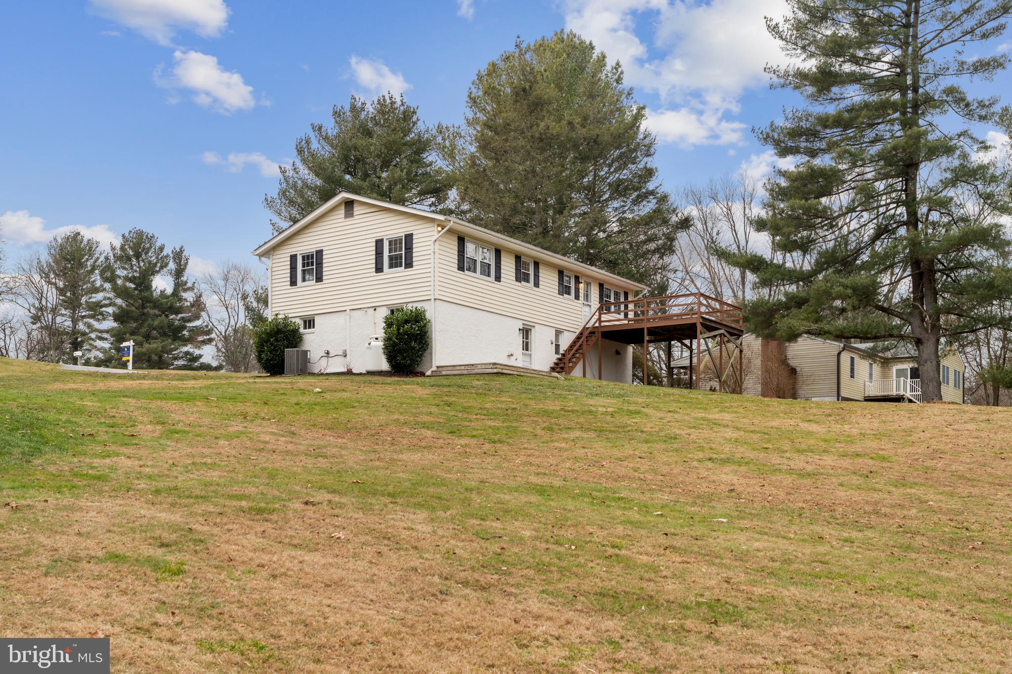 4406 Old Farm Road Baldwin, MD 21013 - Photo 41 of 49 a white house that has a tree in front of it