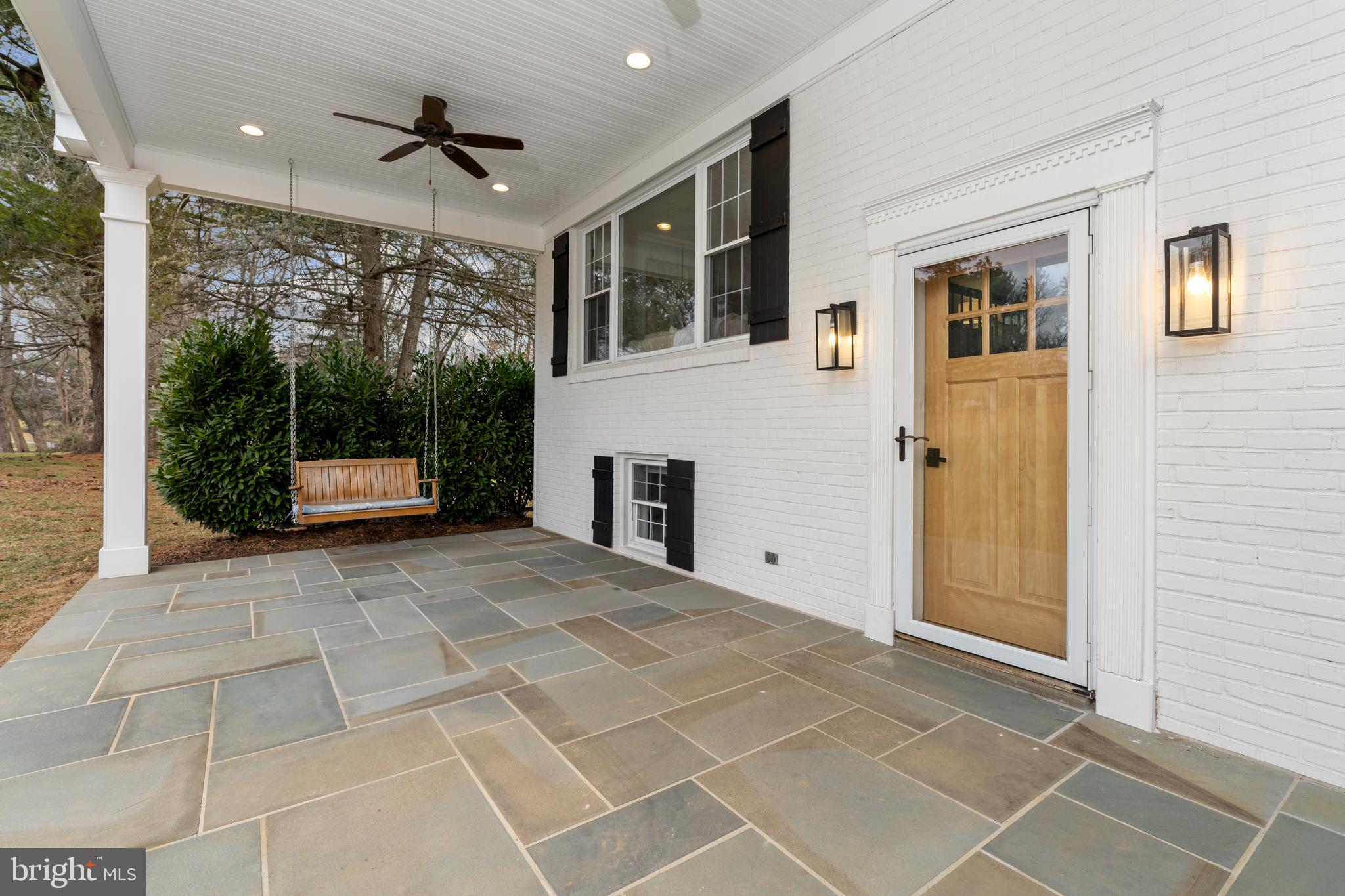 4406 Old Farm Road Baldwin, MD 21013 - Photo 7 of 49 a view of a livingroom with a ceiling fan and windows