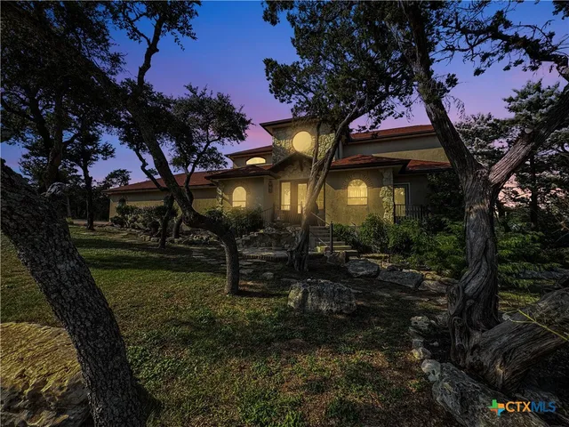 a view of a yard in front of a house