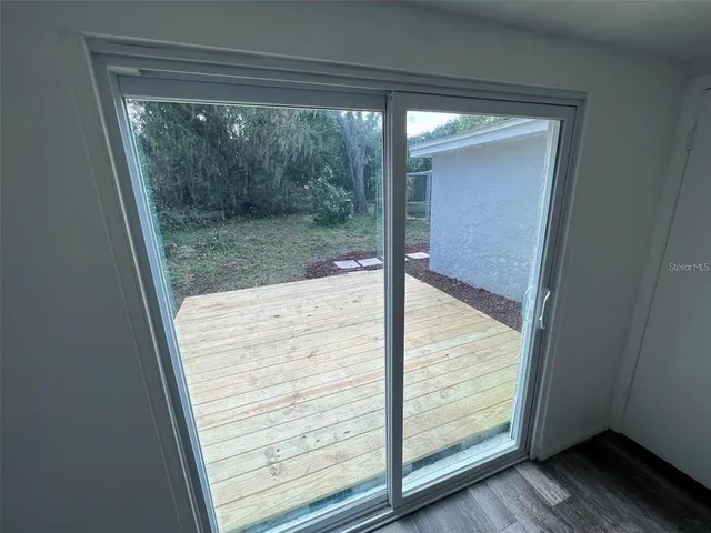 a bathroom with a toilet a sink a vanity and mirror