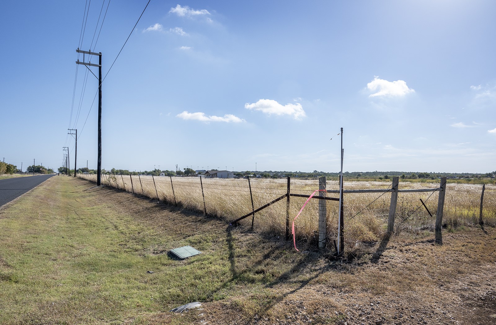Taken at the most western corner of the 8.24 acres that is contiguous to the 22.99 acres totaling 31.41 acres.