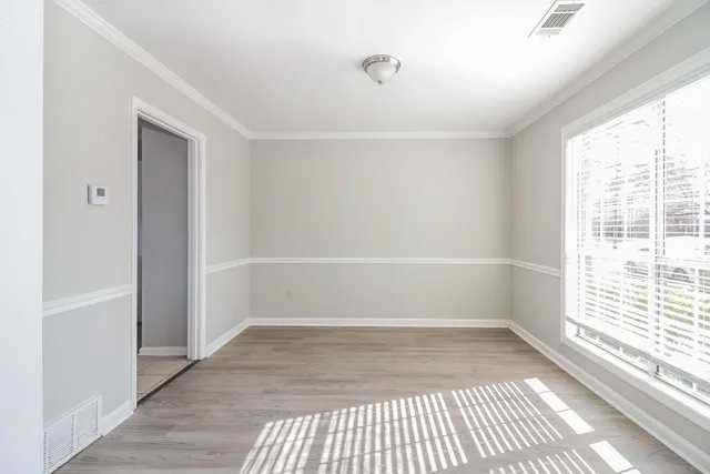 a view of a room with a window