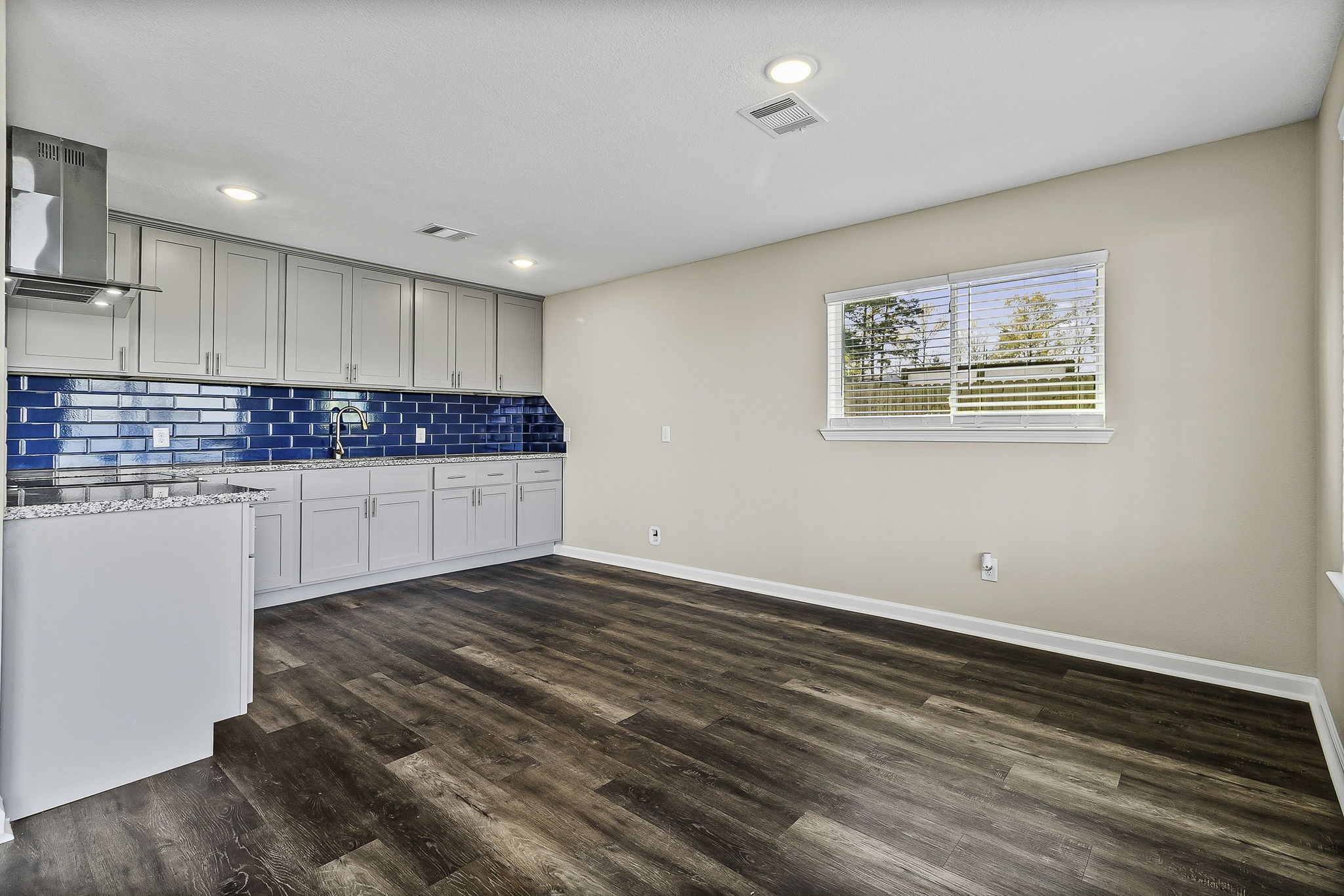 416 Kickapoo Drive Livingston, TX 77351 - Photo 13 of 36 a view of a kitchen with wooden floor