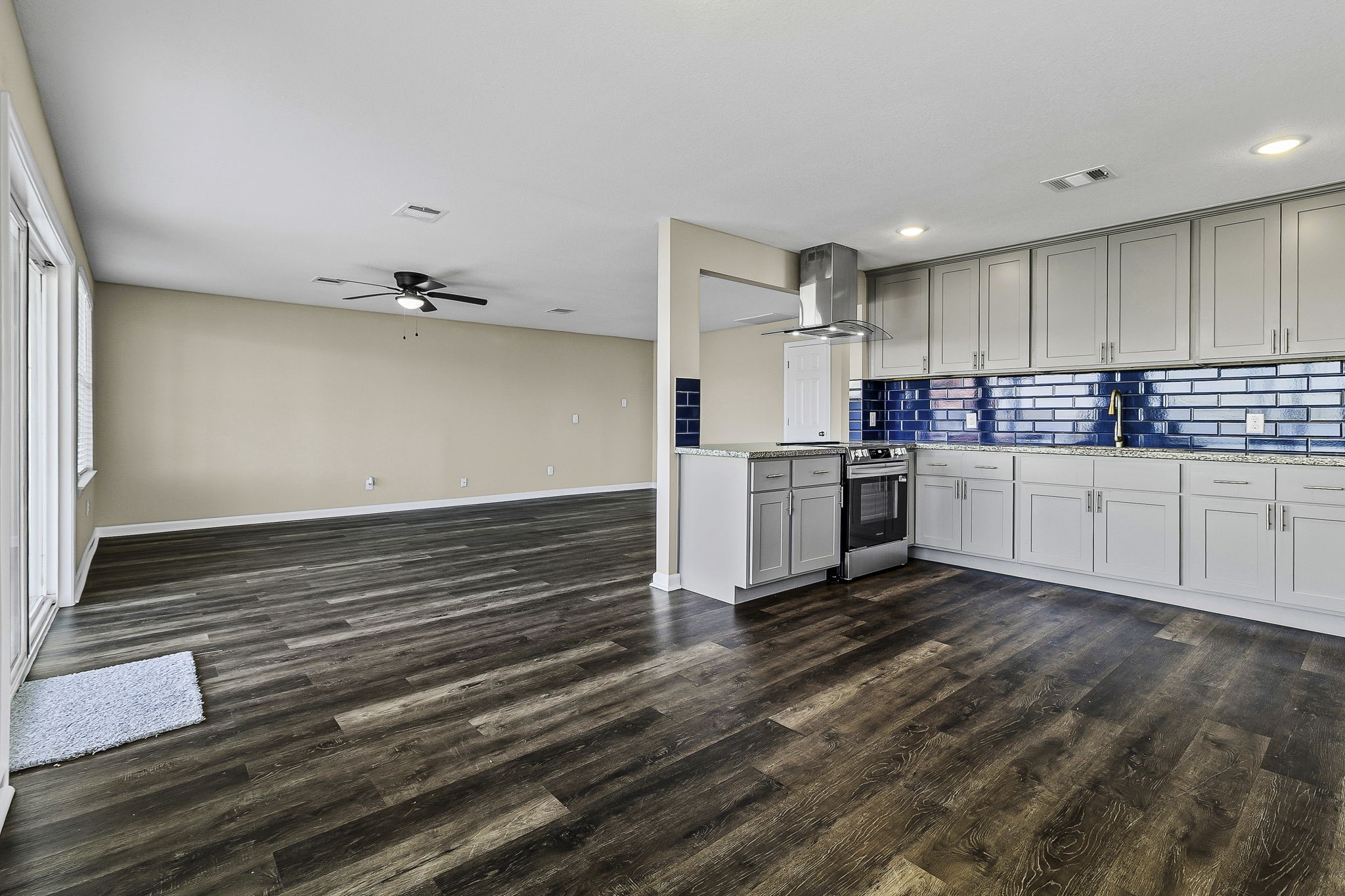 416 Kickapoo Drive Livingston, TX 77351 - Photo 15 of 36 a kitchen with stainless steel appliances a white cabinet and cabinets
