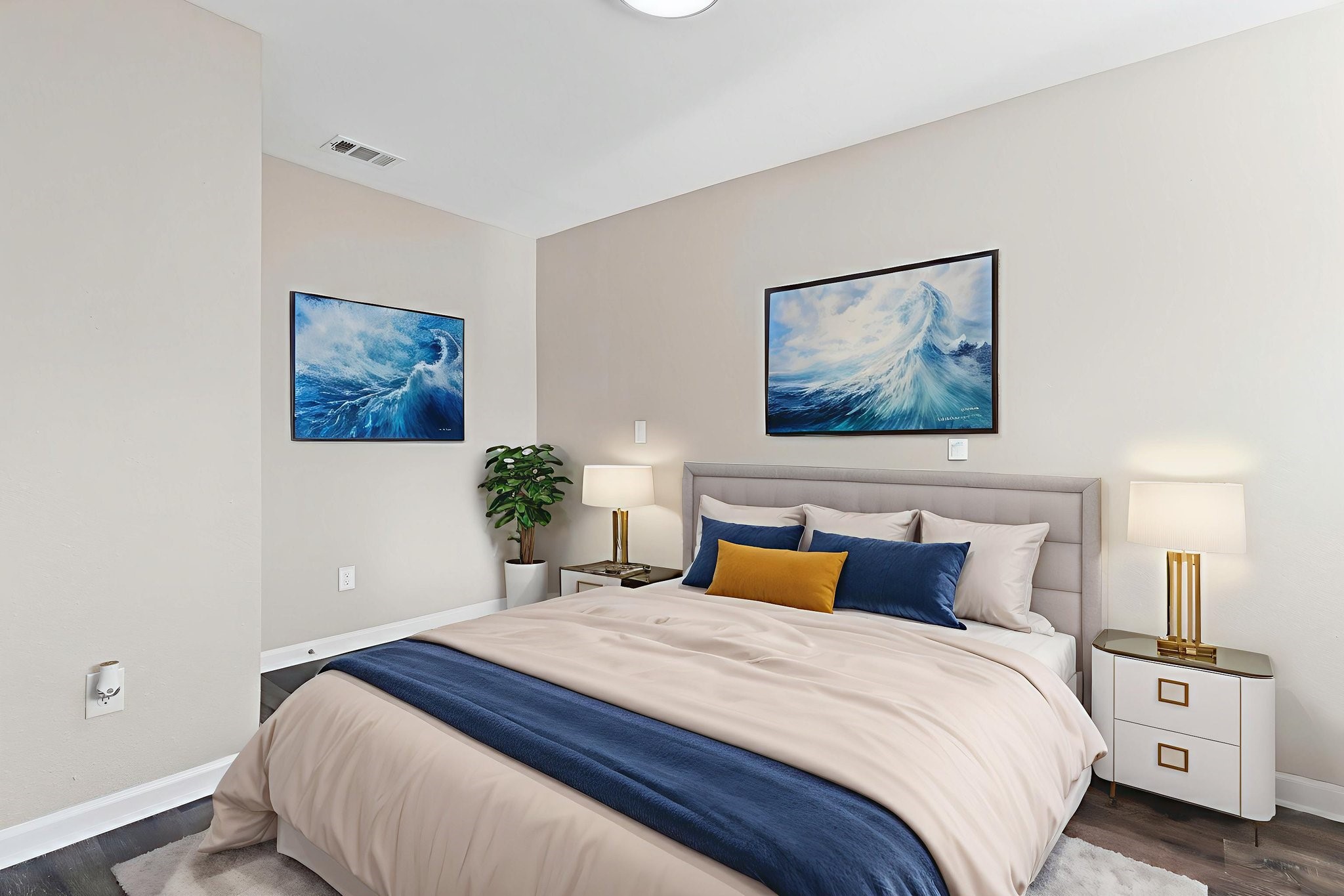 416 Kickapoo Drive Livingston, TX 77351 - Photo 20 of 36 a bedroom with a bed and a painting on the wall