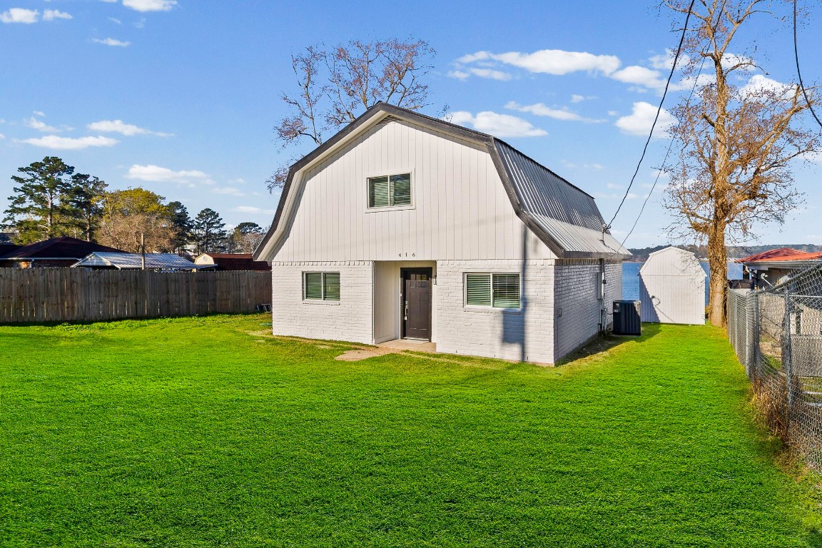 416 Kickapoo Drive Livingston, TX 77351 - Photo 2 of 36 a view of a house with a yard