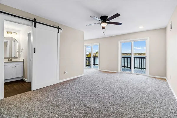 a view of livingroom with hardwood floor and a ceiling fan