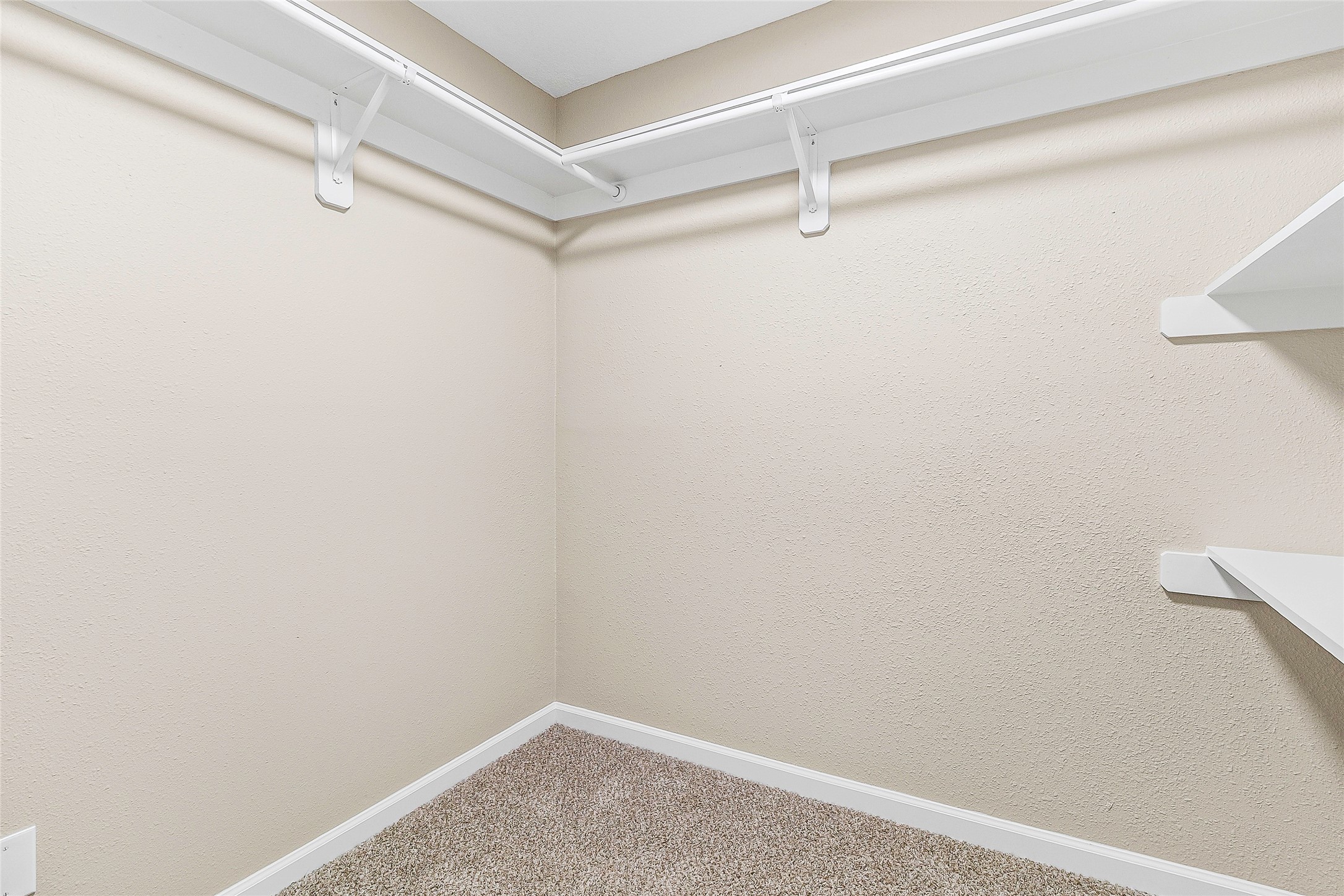 416 Kickapoo Drive Livingston, TX 77351 - Photo 26 of 36 a view of a room with racks on the wall