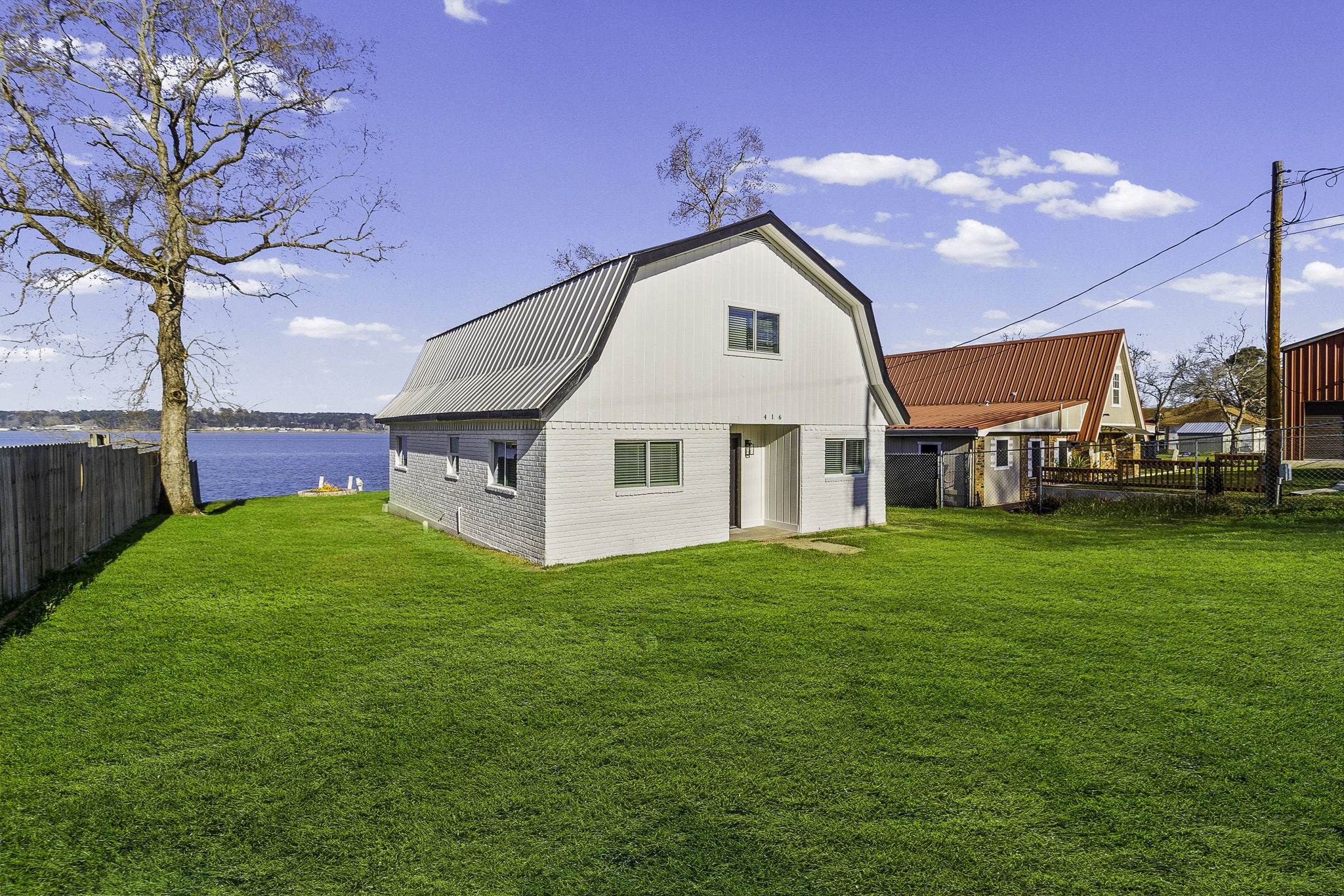 416 Kickapoo Drive Livingston, TX 77351 - Photo 3 of 36 a view of a house with a yard