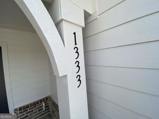 1333 Mooty Bridge Road, Unit 2 LaGrange, GA 30240 - Photo 2 of 17 a view of staircase with white walls