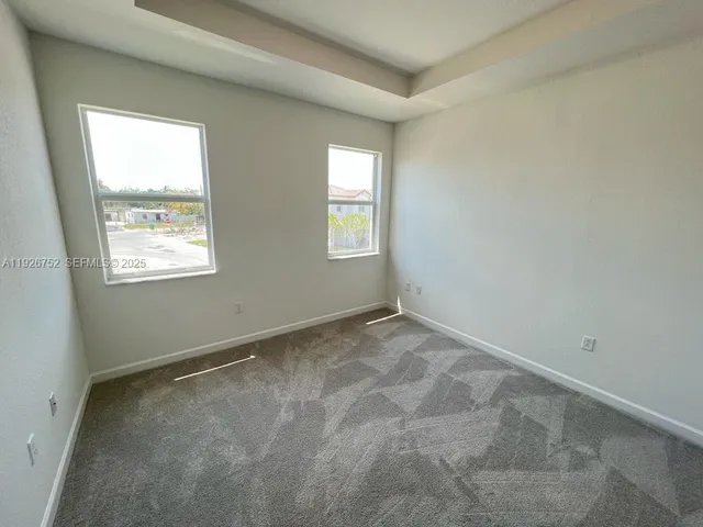 an empty room with a workbench