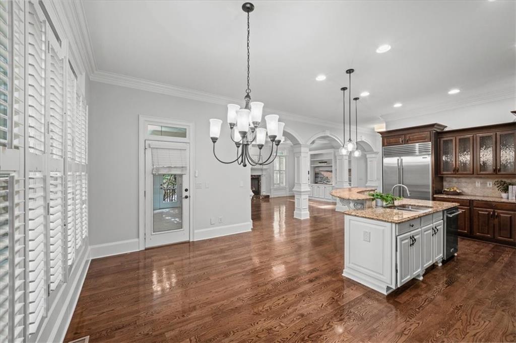 3594 North Druid Hills Road Decatur, GA 30033 - Photo 14 of 57 a kitchen with stainless steel appliances granite countertop a stove oven and a wooden floors