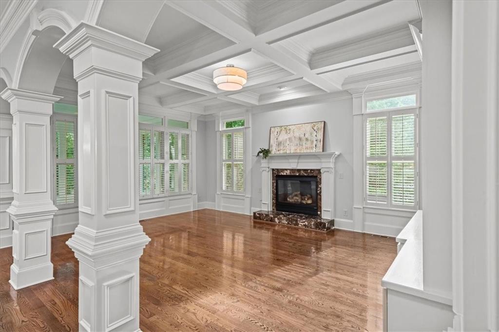 3594 North Druid Hills Road Decatur, GA 30033 - Photo 16 of 57 a view of an empty room with a fireplace and a window