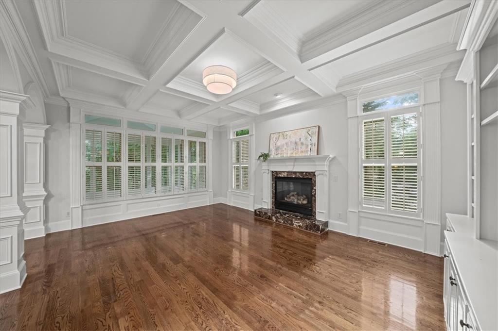 3594 North Druid Hills Road Decatur, GA 30033 - Photo 17 of 57 an empty room with furniture and a fireplace