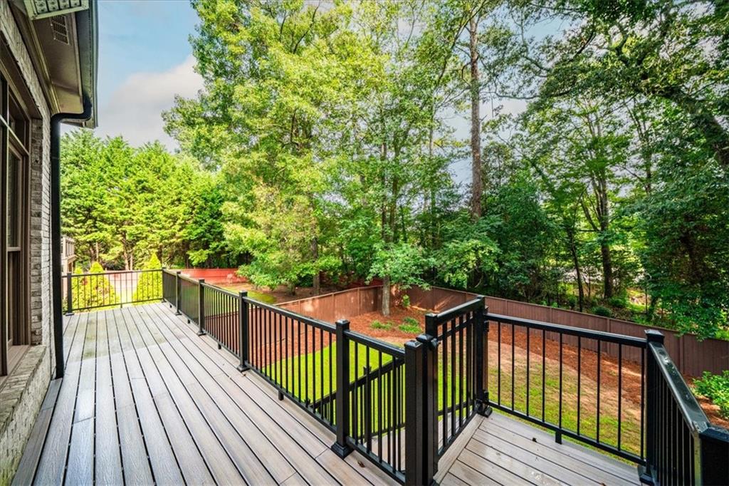 3594 North Druid Hills Road Decatur, GA 30033 - Photo 22 of 57 a view of balcony with wooden floor and fence