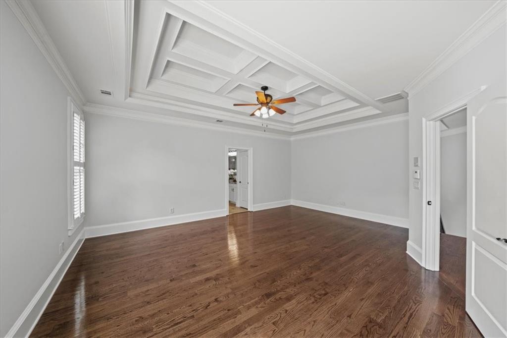 3594 North Druid Hills Road Decatur, GA 30033 - Photo 28 of 57 wooden floor in an empty room with a window