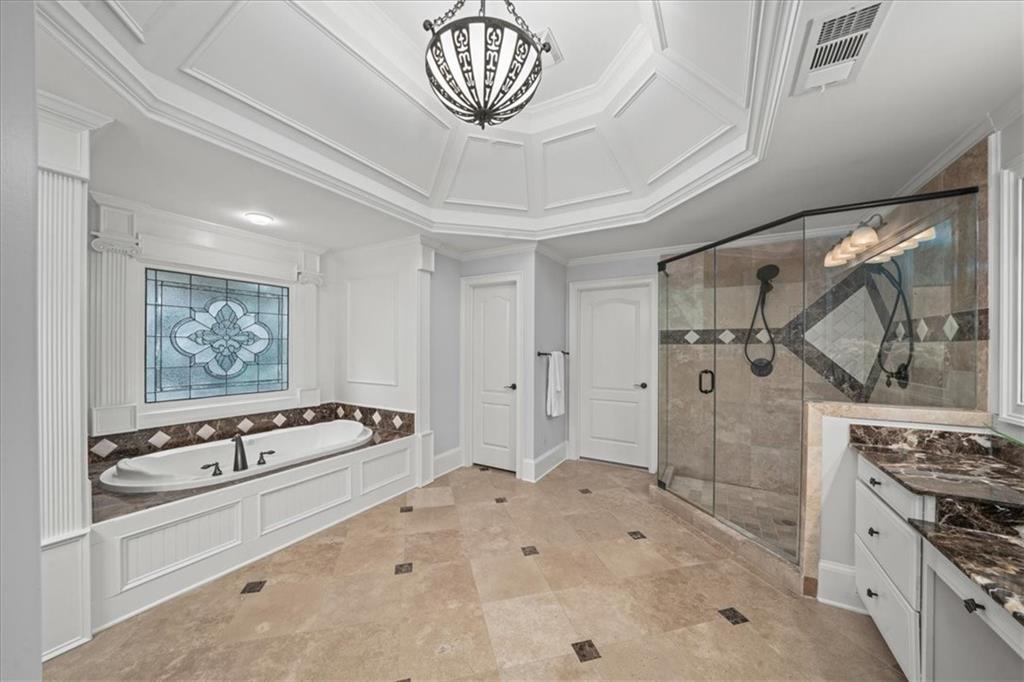 3594 North Druid Hills Road Decatur, GA 30033 - Photo 31 of 57 a very nice looking room with a dining table a mirror a washer and dryer