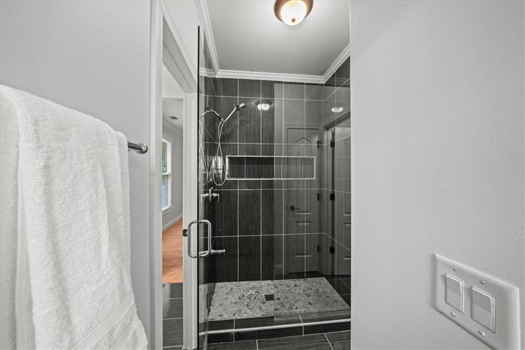 3594 North Druid Hills Road Decatur, GA 30033 - Photo 38 of 57 a bathroom with a shower and a sink