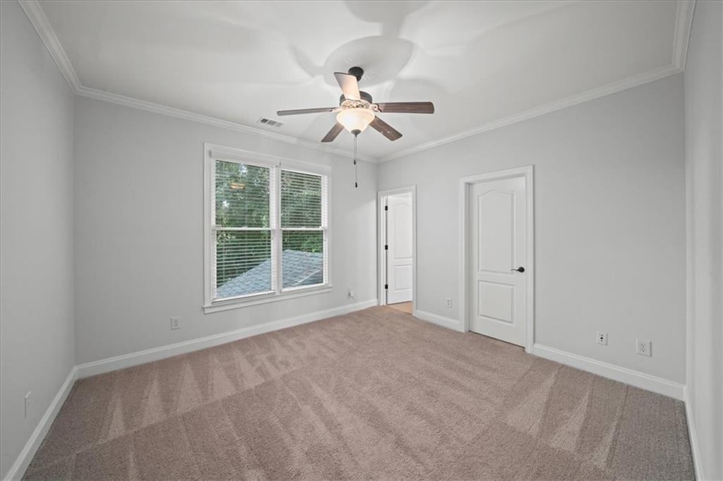 3594 North Druid Hills Road Decatur, GA 30033 - Photo 43 of 57 a view of an empty room with a window