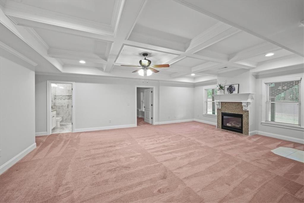 3594 North Druid Hills Road Decatur, GA 30033 - Photo 48 of 57 a view of an empty room with a fireplace and a window