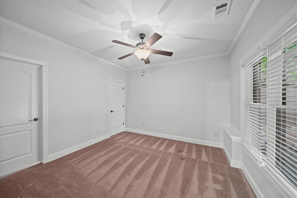 3594 North Druid Hills Road Decatur, GA 30033 - Photo 50 of 57 a view of an empty room with a window