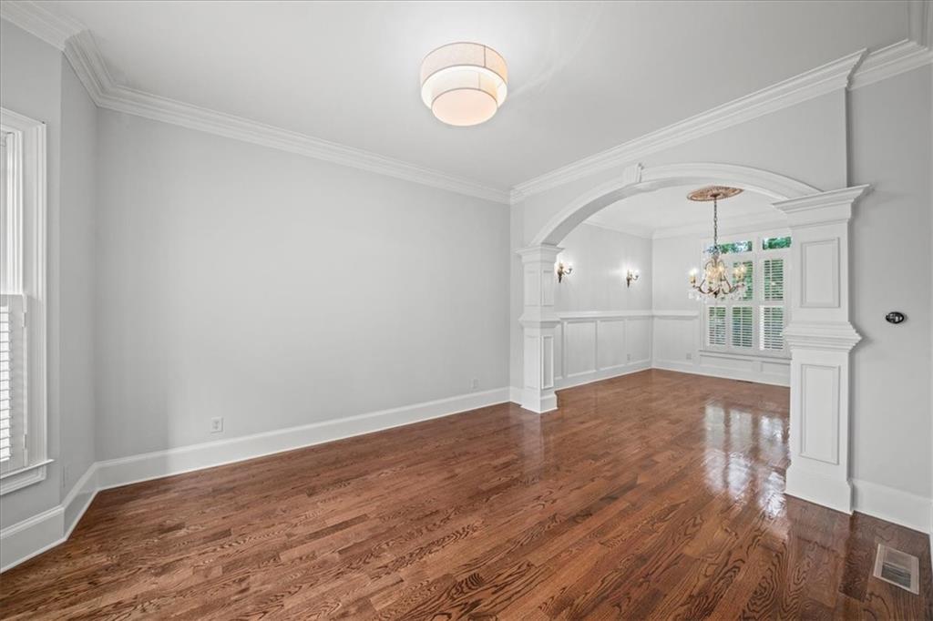 3594 North Druid Hills Road Decatur, GA 30033 - Photo 5 of 57 a view of empty room with wooden floor and fan