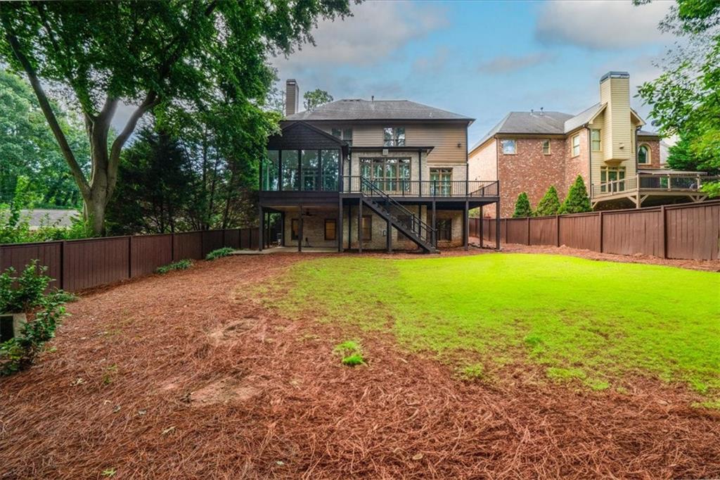 3594 North Druid Hills Road Decatur, GA 30033 - Photo 54 of 57 a view of a house with a yard porch and sitting area