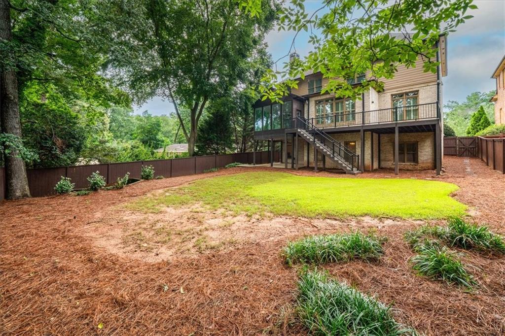 3594 North Druid Hills Road Decatur, GA 30033 - Photo 55 of 57 a view of a house with swimming pool and sitting area