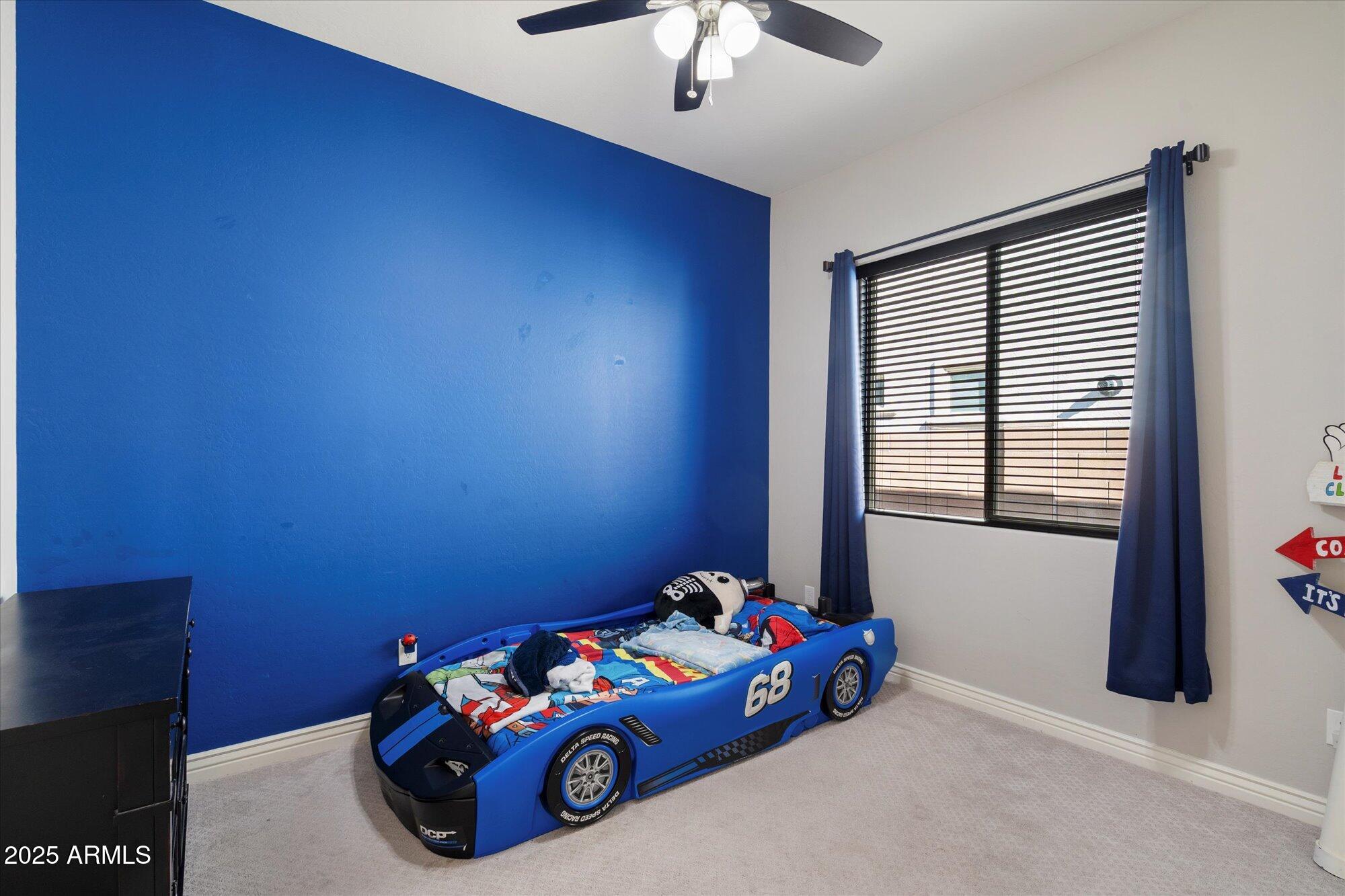 7424 West Jasmine Trail Peoria, AZ 85383 - Photo 20 of 30 a room with toys and two windows